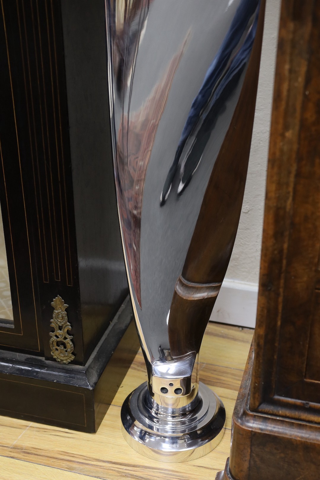 A polished aluminium aircraft propeller